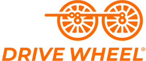 Two sets of orange train wheels connected with a tie bar