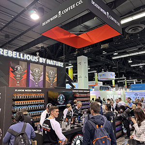 Expo West Tradeshow booth - coffee booth with an overwhelming amount of dark graphics and displays