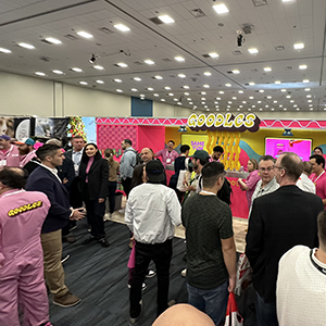 Expo West Tradeshow booth - goodles booth has their team members dressed in pink jump suits