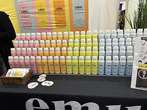 Expo West Tradeshow booth - rows and rows of product in a rainbow of color