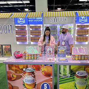 Expo West Tradeshow booth - booth, freezers, and staff are wearing an overwhelming number of colors and patterns