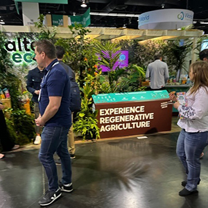 Expo West Tradeshow booth - plants growing everywhere in a tradeshow booth