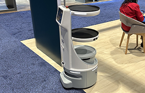 round three tier robot designed to take pizza to tables at the National Restaurant Association Show