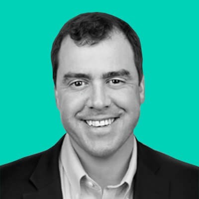 Mike Black head shot with blue background