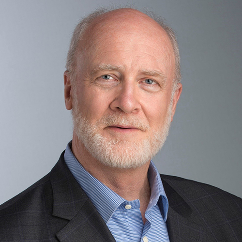 Roger Davidson head shot in a suit