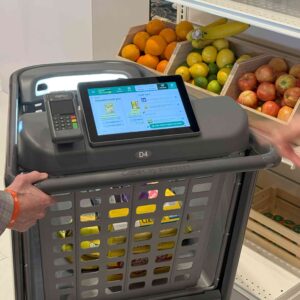 smart shopping cart next to produce groceries